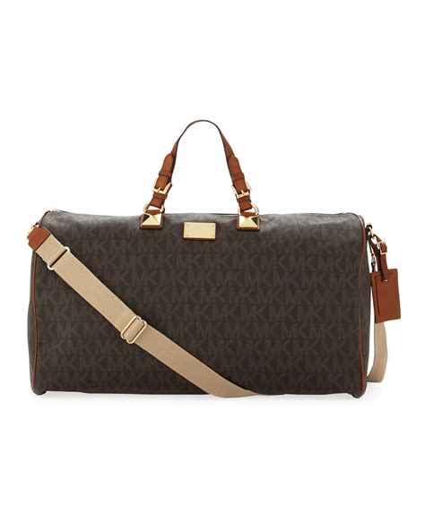 men's michael kors duffle bag|Michael Kors suitcase set.